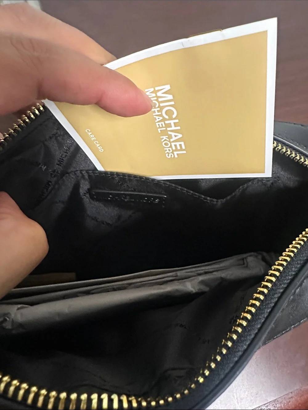 Michael Kors Black Pebbled Leather Messenger Bag with Logo Strap
